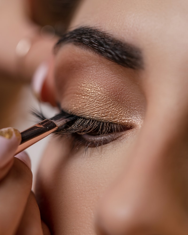 Makeup being applied with a brush