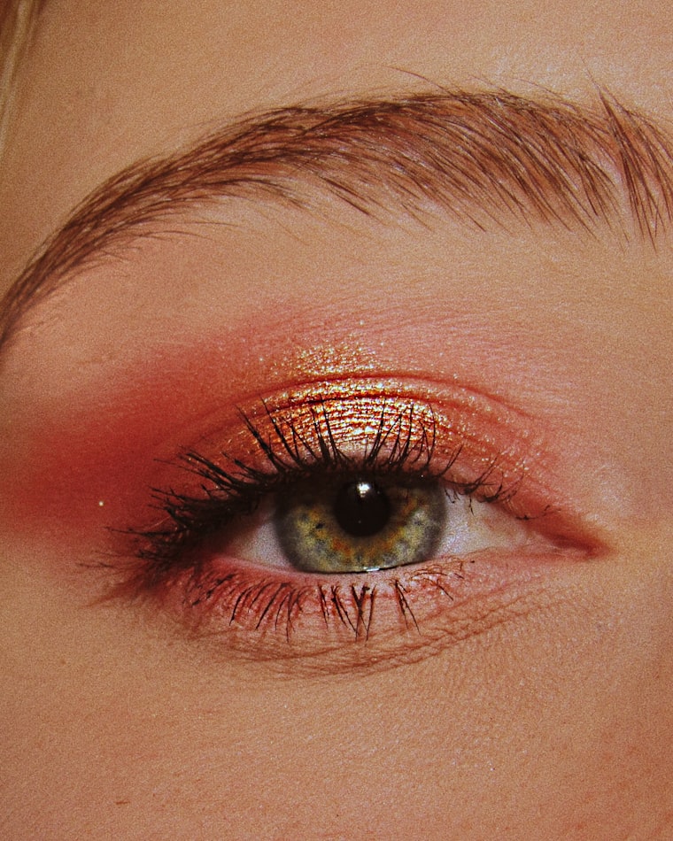 Coral and gold shimmer eyeshadow close-up
