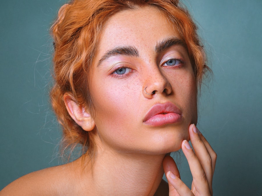Natural glowing makeup with freckles showing through